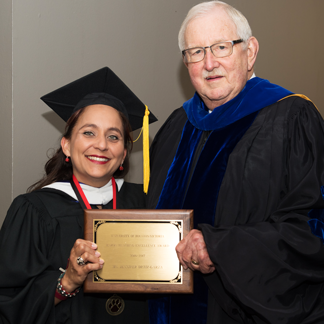 Jennifer Ortiz-Garza poses with Dr. Vic Morgan