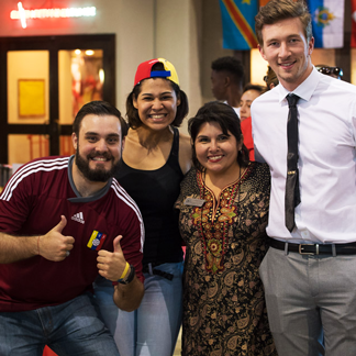 Students and staff pose for photo in Jag Hall