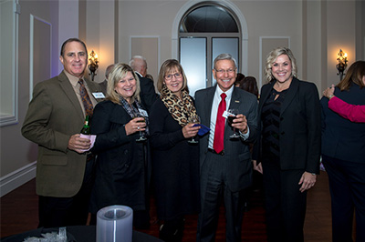 Randy Faulk, Wayne Beran, and Courtney Middleton-Sides with donors